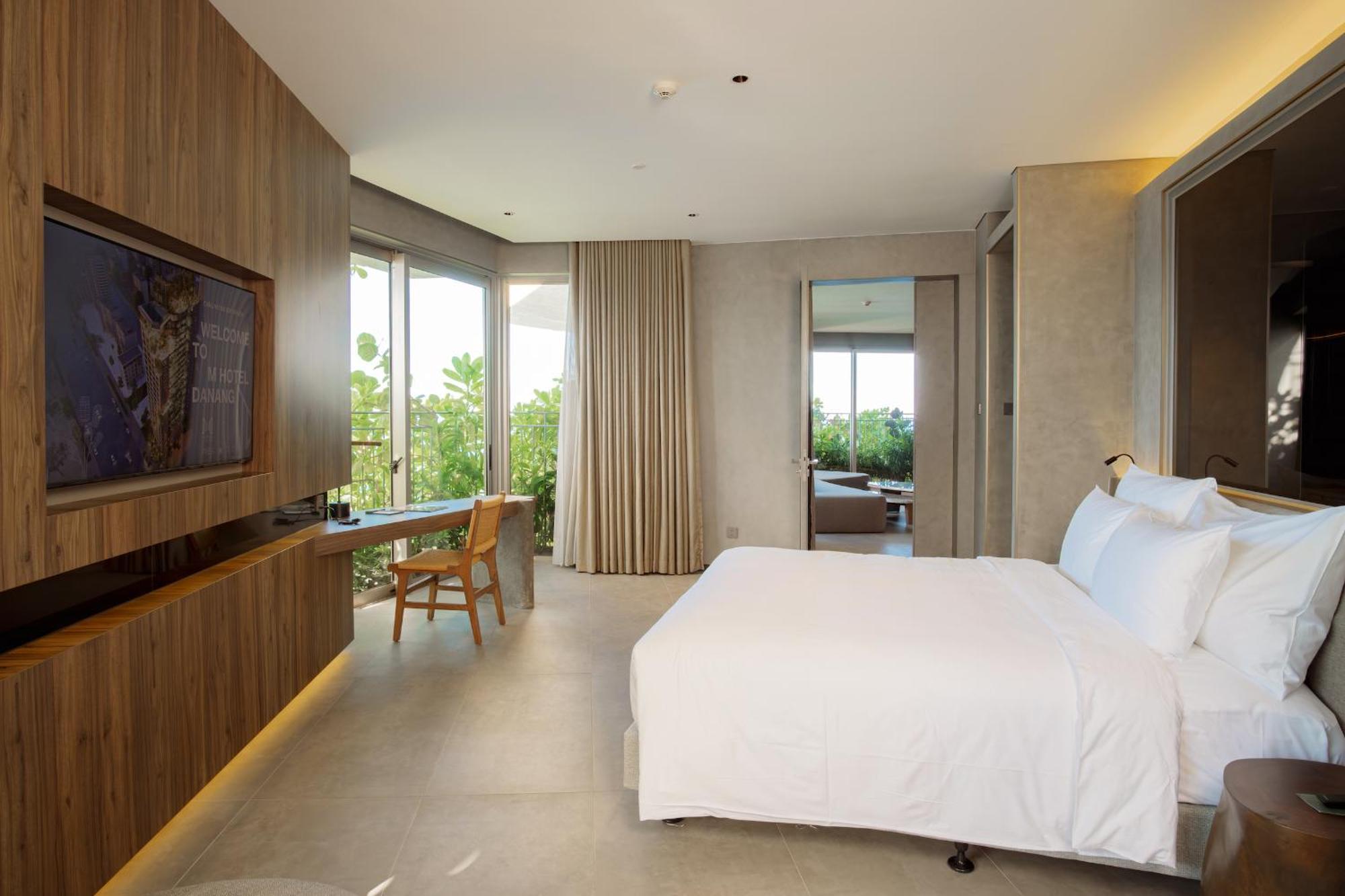M Hotel Danang المظهر الخارجي الصورة A bedroom at the hotel